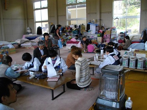 NCGM staff examines people at a shelter